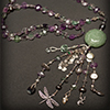 Beaded Necklace by Kris Glenn, Dirt Road Jewelry LLC, Santa Fe New Mexico. Custom Bracelets, Necklaces and Earrings. Jade pendant, sterling silver Balinese beads, faceted fluorite, pearls, cloisonné and a variety of sterling silver charms.