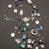 Four strand necklace includes cloisonné, turquoise, amazonite, paua and many other stones and charms.  $170