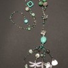 Adjustable necklace with vintage French micro metal beads, tiny turquoise, black onyx and pearl chain.  Beautiful turquoise focal bead with a variety of sterling silver charms, Burmese pumtek bead and other beautiful components.  $425