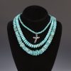 Three separate turquoise necklaces, sterling silver cross and clasps.