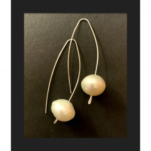 A simple but elegant pair of pearl and sterling earrings.
$65
